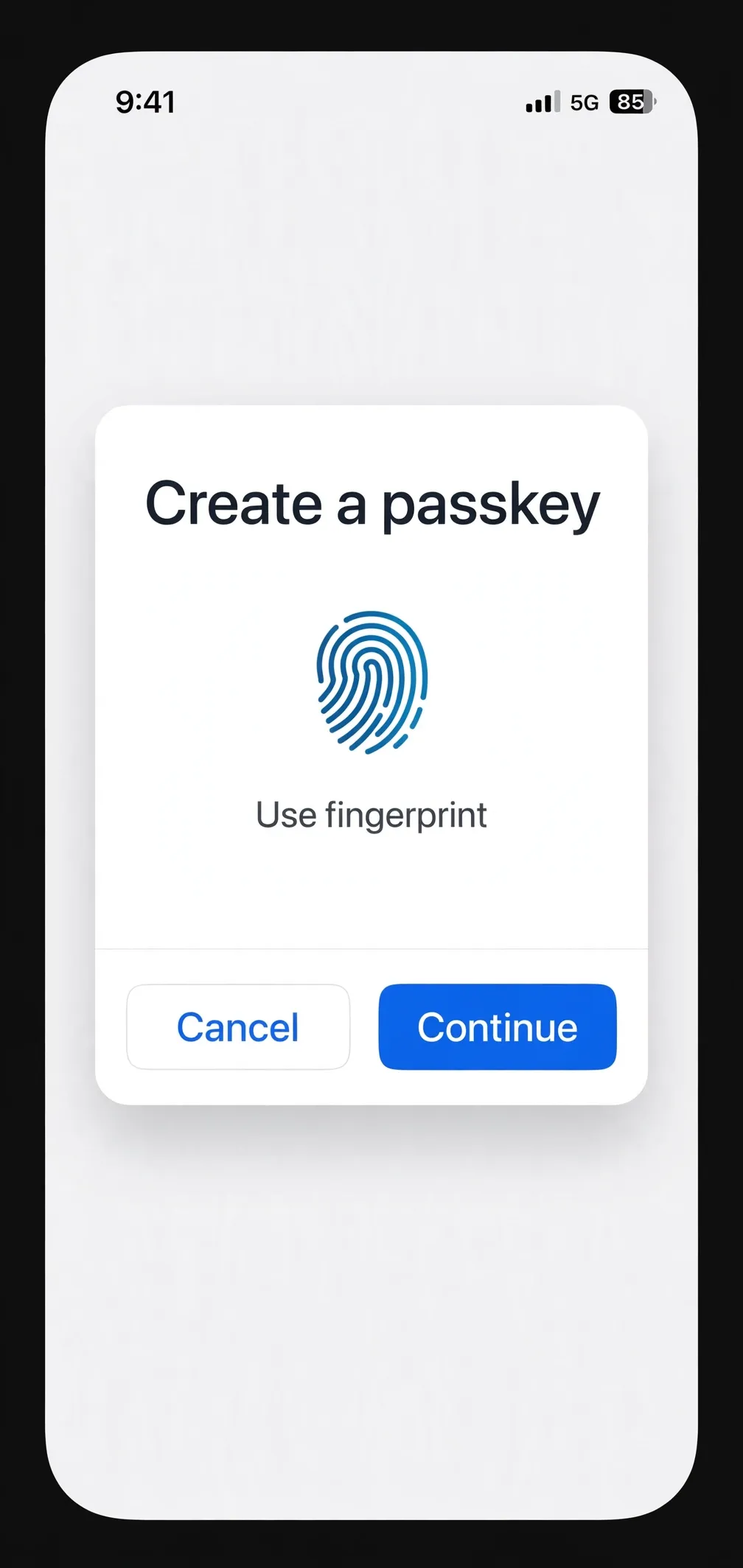 A phone screen showing a Create a passkey dialog with a fingerprint icon and Continue button.